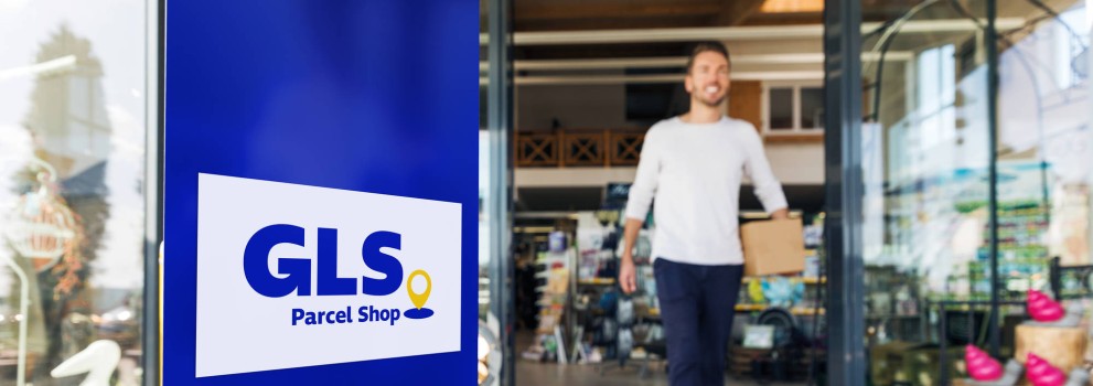 Man leaving a GLS Parcel shop Man leaving a GLS Parcel shop